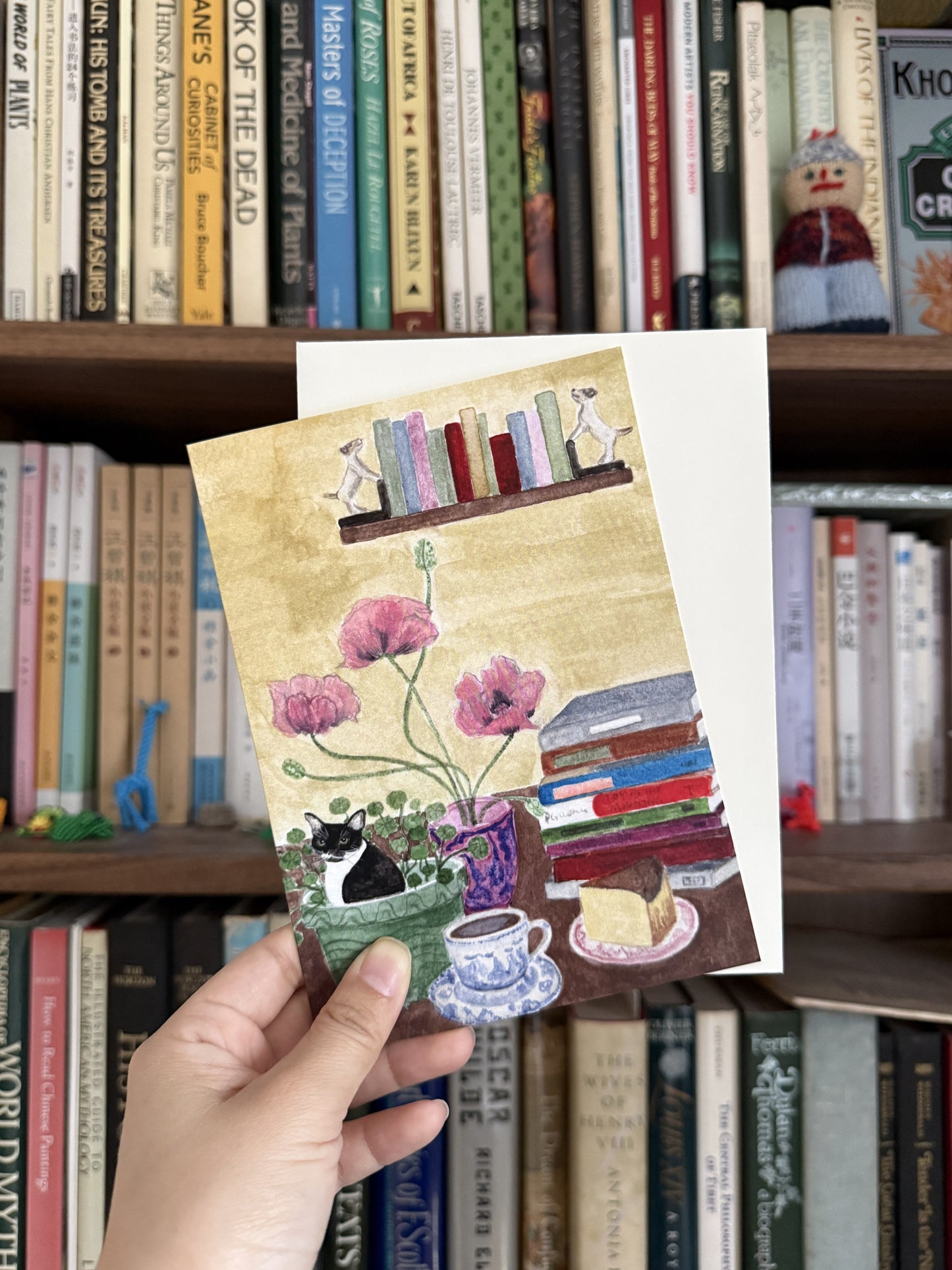 Cat and Books Greeting Card