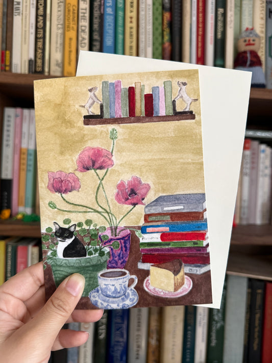 Cat and Books Greeting Card